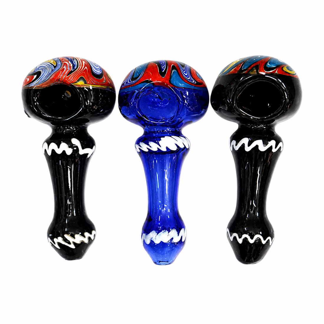 Three hand-blown glass water pipes on a plain white background, featuring black bodies with white zigzag patterns and colorful red, blue, and yellow swirls on the top.

