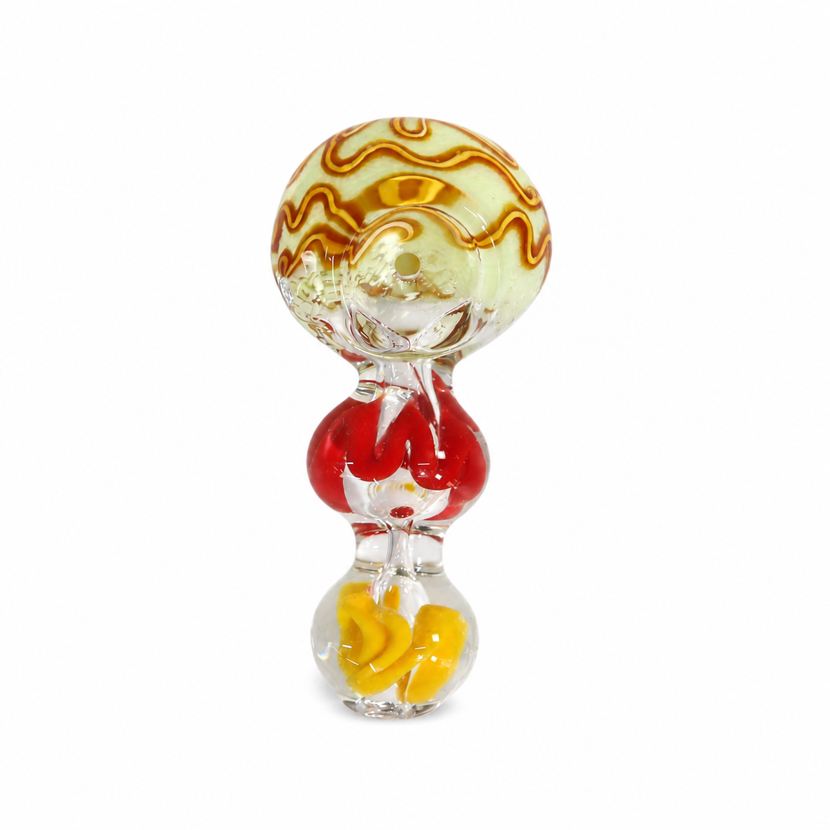 A hand-blown glass object with a bulbous, stacked design, featuring a top section with wavy amber-brown and pale yellow glass, a middle red glass section, and a bottom clear glass bulb containing yellow inclusions, set against a plain white background.


