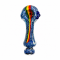 A hand-blown glass smoking pipe with a textured blue speckled body, featuring a vertical red, yellow, and green striped accent and dark blue grape accents on the side, shown against a plain white background.

