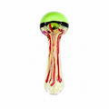 A hand-blown glass water pipe with a bright lime green dome top, a black band, and red and yellow marbled glass dripping down into a clear, glittery base, shown on a solid white background.

