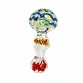 A hand-blown glass water pipe with a clear glass body, a green and blue patterned top bulb, gold decorative swirls in the middle, and red glass beads inside the bottom bulb, shown on a white background.


