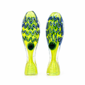 A pair of hand-blown glass fish-shaped ornaments with vibrant lime green bodies, blue and green wavy patterns, and dark green glass eyes, set against a plain white background.

