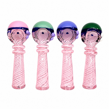 Four pink glass smoking accessories with spiral-striated stems and colorful spherical tops in pink, green, blue, and dark green, arranged side by side on a white background.

