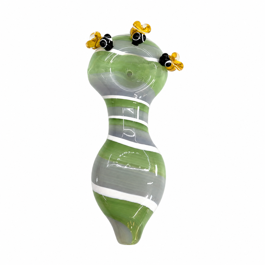 Two handmade glass sculptures shaped like female breasts, decorated with green, blue, and white stripes and small yellow-and-black bumblebee figures on top, set against a plain white background.

